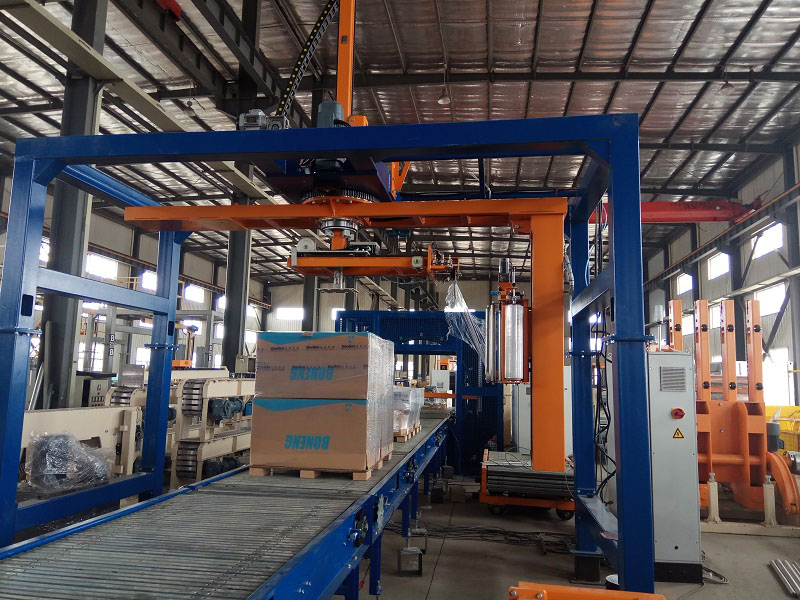 Arm rotary stretch wrapper Arm rotary stretch wrapper